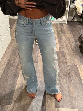 Distressed Light Blue Women’s straight leg Jeans